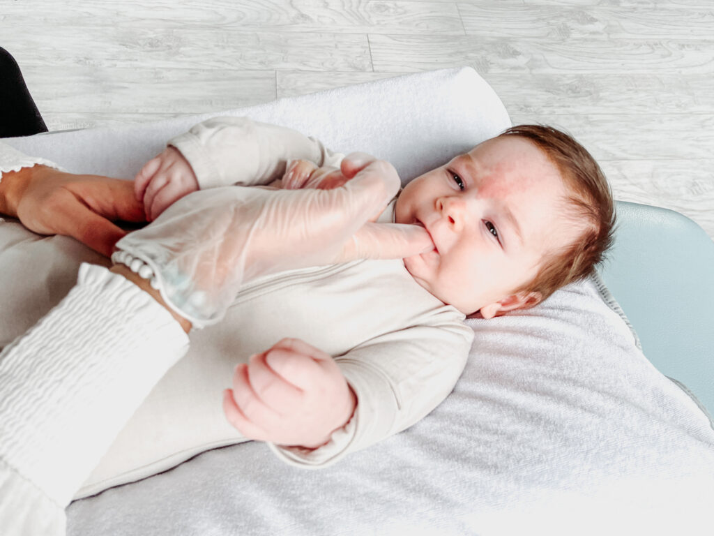 infant receiving chiropractic care in Toronto